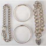 Four silver bracelets, 86g.