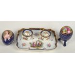 A Meissen oblique Drove Down ink stand, together with two continental porcelain egg boxes,