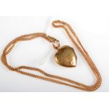 A 9ct. gold heart shaped locket pendant on 9ct. gold chain, 10.7g.