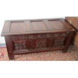 A 17th century carved oak joined chest.