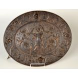 An ornate American Radiator Company cast iron, oval plaque with gilt heightening, width 48cm.
