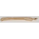 An 18ct. gold bead link chain, 12.8g.