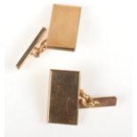 A pair of plain 9ct. gold cufflinks, 8.3g.