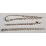 A contemporary silver necklace and matching bracelet, together with a silver belcher link necklace.