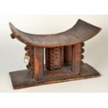 An Ashanti carved wood stool.