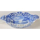 A 19th century Spode 'Italian' pattern basket of boat shape with twin pierced handles,