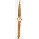 A ladies 9ct. gold Vertex Review wristwatch on gold mesh bracelet. 14.