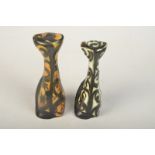 Two Celtic Pottery cats, one green, height 17cm, the other orange, height 18.5cm.