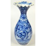 A Japanese blue and white vase with a flared rim, the body decorated with birds and trees,