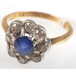 An 18ct. gold sapphire and diamond flowerhead cluster ring.