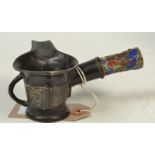 A Chinese metal oil pourer with an enamel decorated handle, height 5.5cm.
