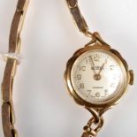 A ladies Roamer 9ct. gold wristwatch on 9ct. gold bracelet, fitted case. 13.