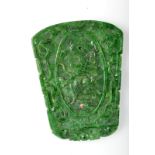 A Chinese emerald green jade pendant of tapered, rectangular form,