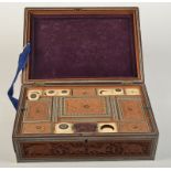 A carved Sadeli work box with well fitted interior.