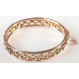 A 9ct. gold bangle, 13.5g.