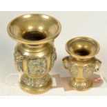 Two Japanese small polished bronze urns, heights 11cm and 8cm.