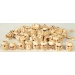 A quantity of bone heads in the form of skulls, possibly Filipino.