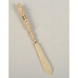 A continental carved bone letter opener/dip pen,