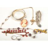 An Art Nouveau gold pendant and chain, a silver bangle, a silver bracelet etc.