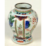 A Chinese porcelain vase, 19th century in late Ming Wucai style, height 17cm.