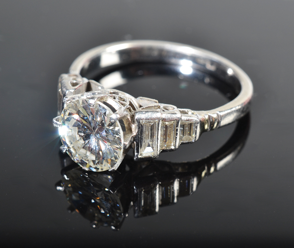 A platinum solitaire diamond ring of approximately 1.