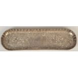 A late Victorian passion flower embossed silver pen tray, by Levi & Salaman, Birmingham 1888.