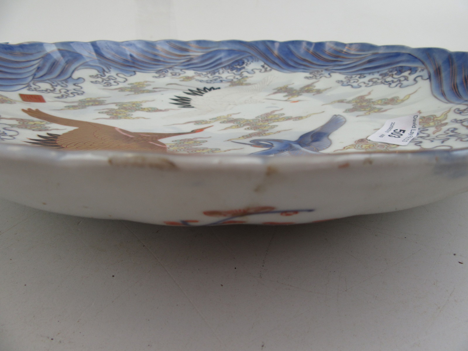 A Japanese Fukagawa dish, decorated with cranes in flight and bands of cloud, - Image 2 of 5