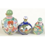 Three Chinese snuff bottles.