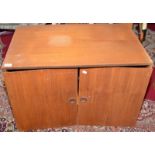 A 1960s sectional, teak veneered unit.