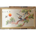 A Chinese Republic period gilt framed silk picture of an eagle seated on a branch before a sunset,