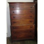 A George III mahogany chest on chest, the upper section with fluted canted corners,