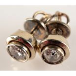 A pair of diamond stud earrings, each approximately .2ct.