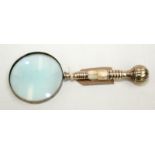A silver plated mother of pearl mounted magnifying glass, full length 26cm.