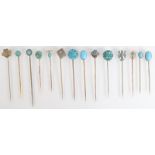 Fourteen various pins set with turquoise including gold.