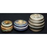 Three Mary Rich studio porcelain lidded boxes, the lid of one with stylised heart.