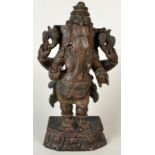 An Indian carved wood figure of Ganesh, the god of wisdom and learning, height 47cm.