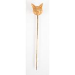 A 15ct. gold fox's mask pin with diamond eyes, case of Tessiers, New Bond Street, London.