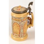 A Villeroy & Boch Mettlach tankard with relief decoration,