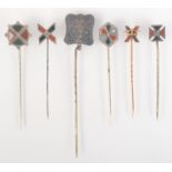A Scottish gold regimental hard stone set pin, five other Scottish hard stone set silver pins.