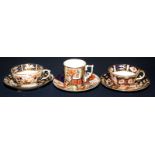 A Royal Crown Derby Pardoe pattern coffee can and saucer and a Royal Crown Derby Japan pattern tea