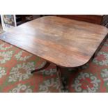 A Regency mahogany snap top supper table.