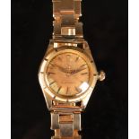 A Rolex Oyster perpetual super precision 18ct. gold cased wristwatch on 18ct.