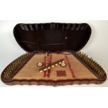 A Chinese zither with retail stamp 'Tak Shing, Mod Plan Street', the strings attached to metal pegs,