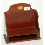 An Asprey, London, inlaid mahogany miniature book stand, tablet label to reverse, width 22.