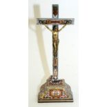A French wooden standing crucifix with silver coloured metal overlay and brass and ivory inlay,