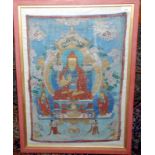 A Tibetan painted cotton thangka depicting a god seated on a gilt decorated throne,