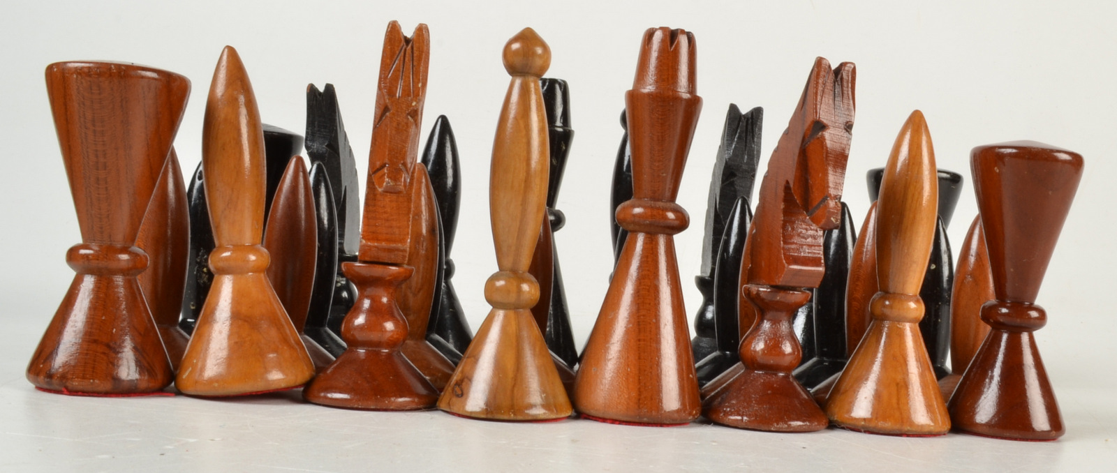 A 1970s/80s turned and carved wood chess set. Condition Report: King is 10cm. - Image 2 of 2