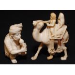 An Indian ivory figure of a camel and two riders, height 7cm and a turbaned,