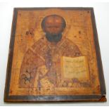 A late 18th century Russian icon on wood of St Nicholas of Myrar wearing the omophorion and holding