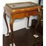 A walnut veneered rectangular jardiniere table in Louis XV style with a gilt gallery and mounts to